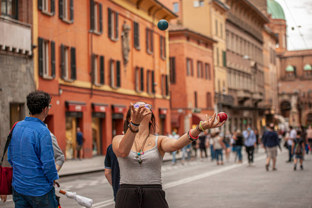 BOLOGNA, ITALY 17 JUNE 2020: Street artist juggler in Bologna, Italy - Zdjęcie, obraz