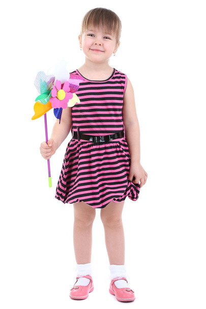 Beautiful little girl holding colorful windmill isolated on white - Foto, immagini