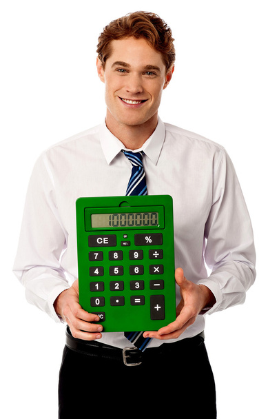 Corporate man showing big green calculator - Photo, Image