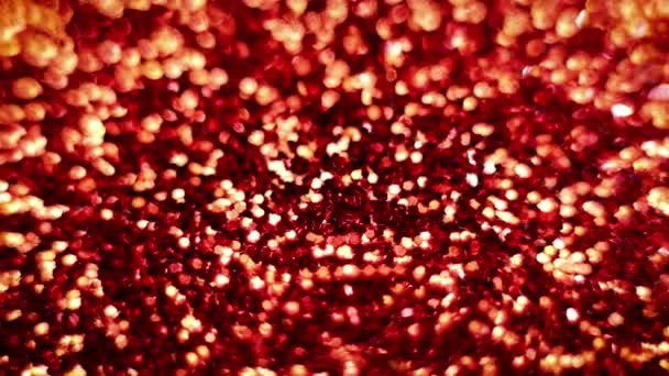 Red Magical Merry Christmas background. Glamour happy valentines day walpaper. Glitterring confetti texture. Full HD video for the New Year, Unniversary celebration and Wedding ceremony. - Footage, Video