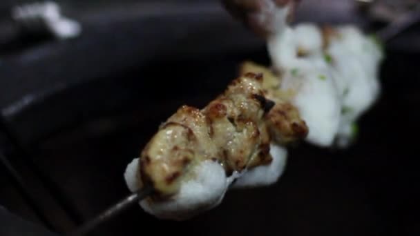Chicken Reshami Tikka. Barbecued chunks of boneless chicken marinated with beaten egg cooked in an Indian tandoor or clay pot. - Footage, Video