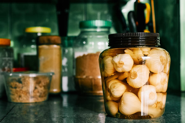 Chinese fermented garlic in jar - Photo, Image