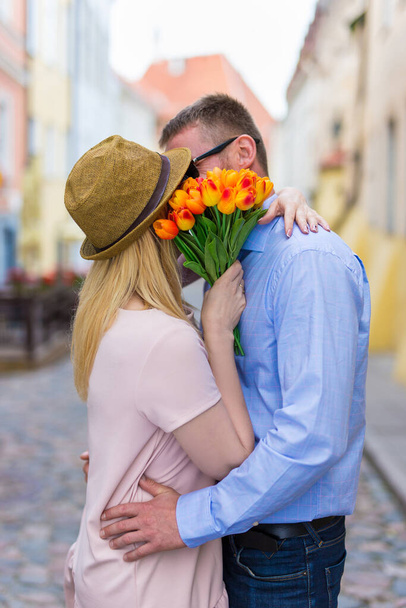 love, dating and relationship concept - young happy couple kissing in the city - Photo, Image