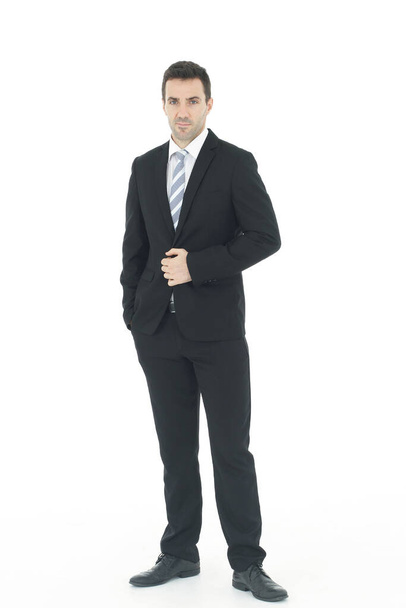Нахабний і розумний бізнесмен у чорному костюмі ізольований на білому тлі. Космічний простір - Фото, зображення
