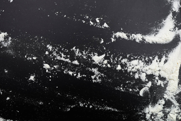 white powder on black background - Valokuva, kuva