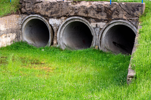 Big old sewage drain pipe or effluent release wastewater. - Photo, Image