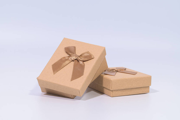 A brown gift box on a white background - Φωτογραφία, εικόνα