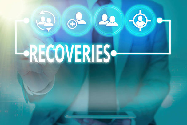 Writing note showing Recoveries. Business photo showcasing process of regaining possession or control of something lost Information digital technology network infographic elements. - Photo, Image