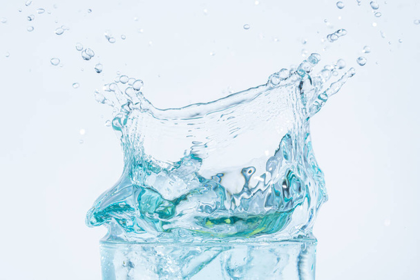 water splash in a glass white background - Foto, imagen