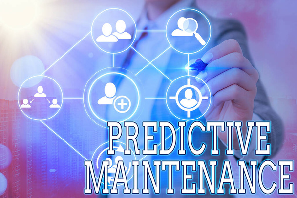 Writing note showing Predictive Maintenance. Business photo showcasing designed to help determine the condition of equipment. - Photo, Image
