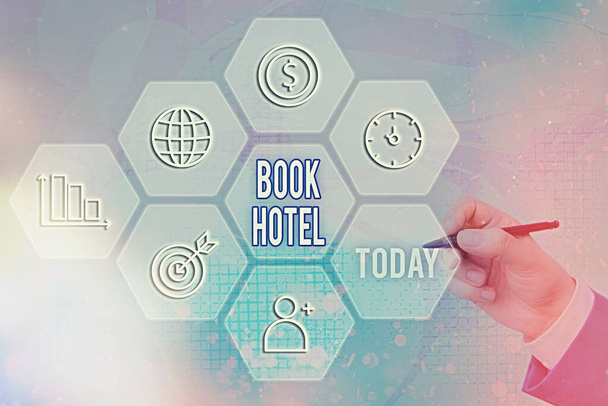 Text sign showing Book Hotel. Conceptual photo reserving an accommodation paid on a shortterm basis in advance. - Photo, Image