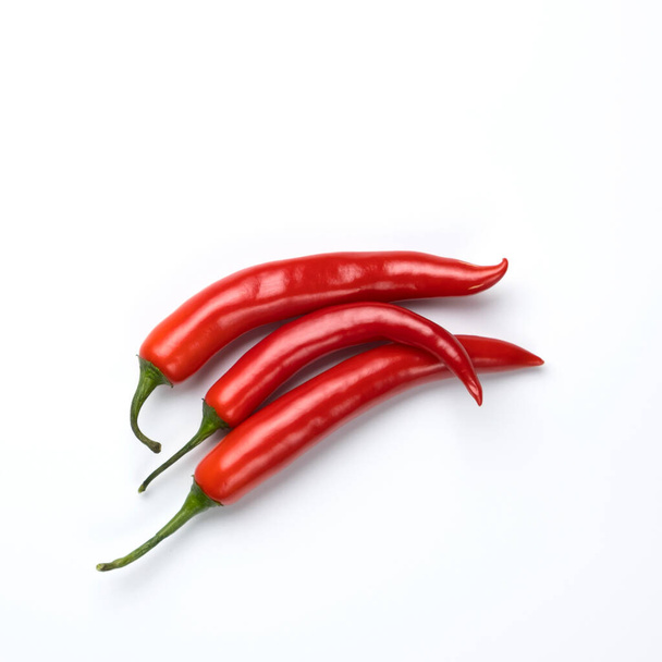 Red chili peppers isolated on white background. - Photo, Image