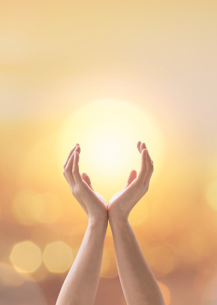 Mind and soul mantra yoga meditation, spiritual mental health practice with woman pose peaceful relaxation training with sunset golden hour summer june solstice sun and sky can candle light bokeh - Photo, Image