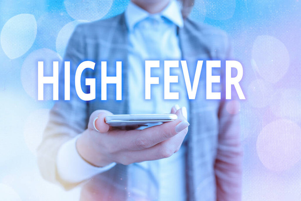 Conceptual hand writing showing High Fever. Business photo showcasing medical condition which the body temperature higher than usual Touch screen digital marking important details in business. - Photo, Image