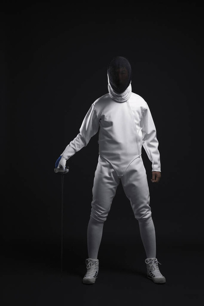 young man with fencing foil - Fotoğraf, Görsel