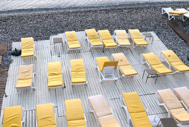 Top view of yellow sunbeds - Photo, Image