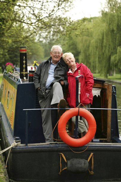Senior couple posing for the camera - Фото, изображение