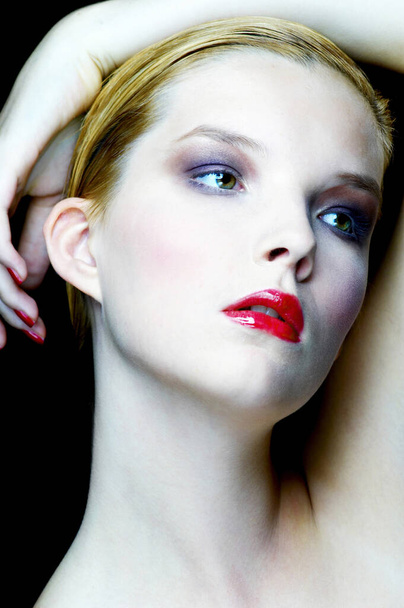 Woman with makeup, studio shot - Foto, Imagem