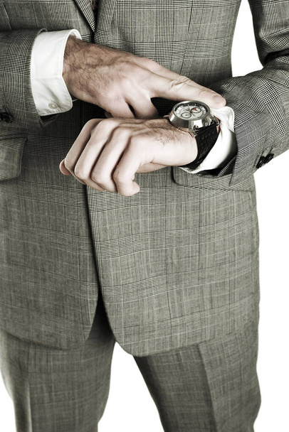 Businessman looking at his watch - Fotó, kép