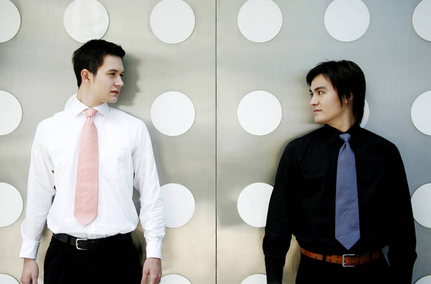Businessmen looking at each other - Фото, зображення