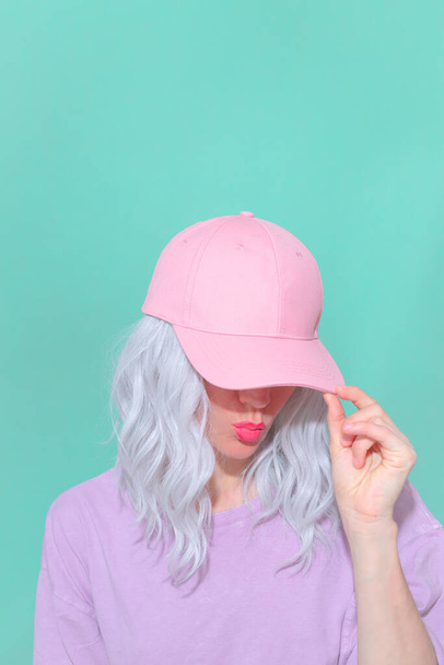 Fashion aesthetic blonde girl in trendy summer accessories. Pink cap Vanilla Pastel colours outfit - Valokuva, kuva