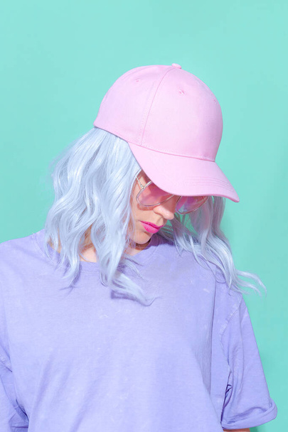 Fashion aesthetic blonde girl in trendy summer accessories. Pink cap Vanilla Pastel colours street style outfit - Valokuva, kuva