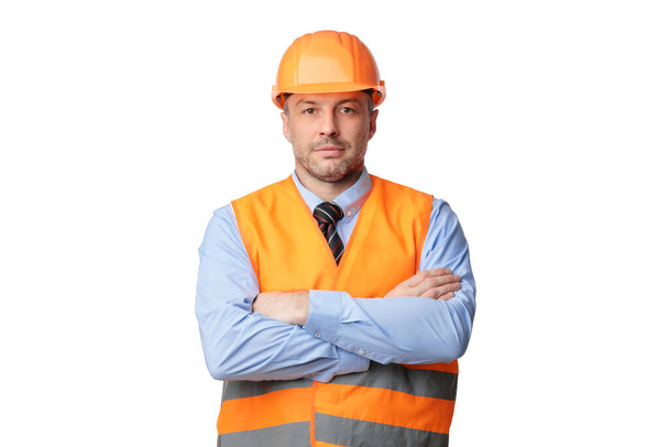Serious Builder Man Posing Crossing Hands Standing Over White Background - Foto, Bild