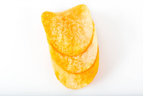 tasty potato chips on white background, close-up view - Foto, imagen