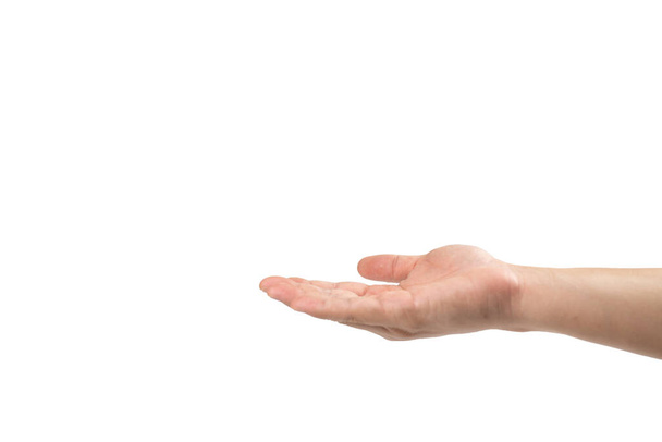 Die Hand des asiatischen Mannes reicht, um etwas auf weißem Hintergrund zu empfangen. Steilpfad - Foto, Bild
