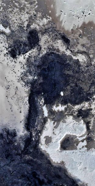 Earth metastasis, black gold, polluted desert sand, tribute to Pollock, vertical abstract photography of the deserts of Africa from the air, aerial view, abstract expressionism, abstract naturalism. - Photo, Image