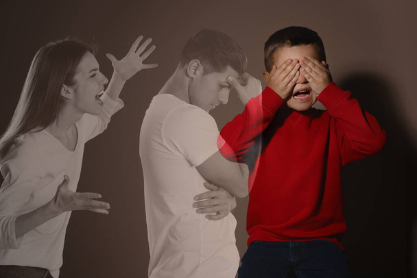 Double exposure of scared little boy and his arguing parents - Fotografie, Obrázek