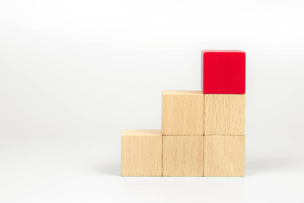 Cube wooden block toy stacked without graphics for Business design concept and build activity for children play create and practices foundation stage. - 写真・画像