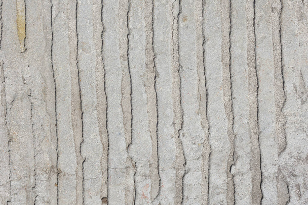 Texture of dirty concrete wall with lines or strips for background - Foto, Bild