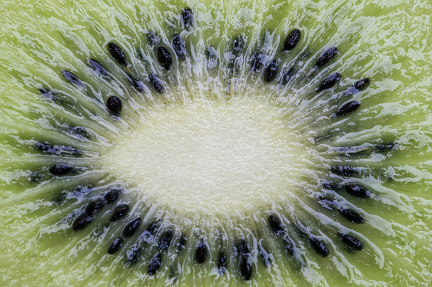 Healthy food. Tropical fruit. Whole and sliced kiwi. Kiwi fruit. Still life.  - Foto, afbeelding