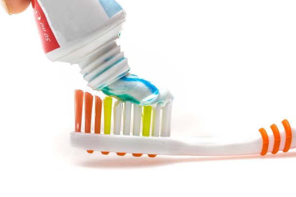 toothbrush with toothpaste on white background - Photo, Image