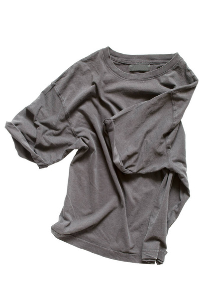 Grey basic crumpled t-shirt isolated over white - Foto, immagini