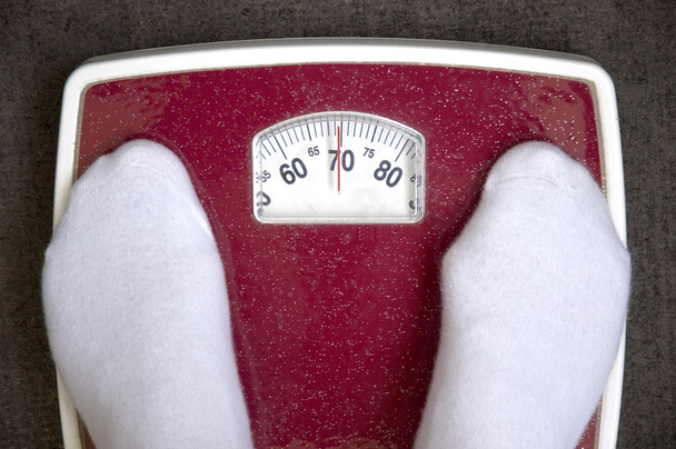 O controle do peso de um corpo
 - Foto, Imagem