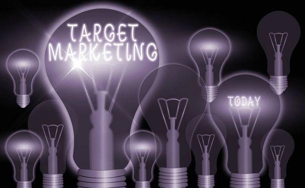 Writing note showing Target Marketing. Business photo showcasing marketer s is most important task also used in buying strategy Realistic colored vintage light bulbs, idea sign solution. - Photo, Image