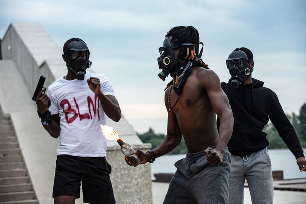 cruel black people go on demonstrations and rowdy - Foto, Imagen