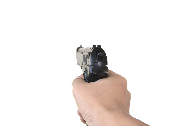 hand holding gun isolated on white background - Photo, Image