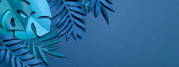 Paper cut fake tropical leaves banner. - Photo, Image