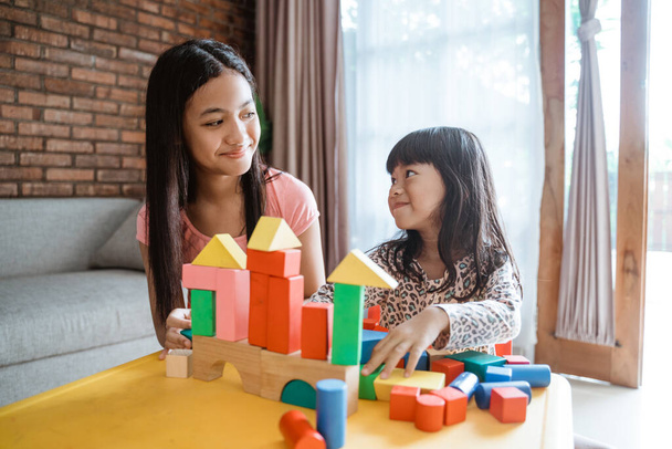 sister play with blocks puzzle - Photo, Image