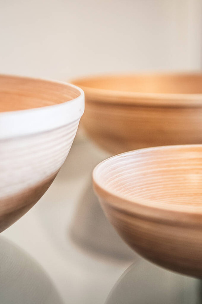 Neat and simple design natural color wooden bamboo bowls close up shot - Photo, Image