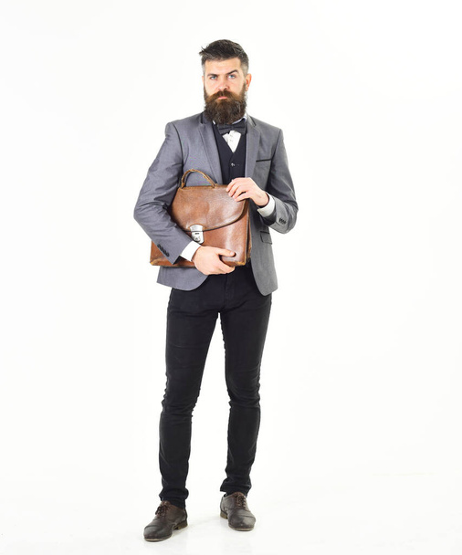 Businessman with a briefcase isolated on white background - Valokuva, kuva