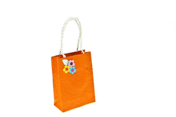 Orange mulberry paper bag isolated on white background - Photo, Image