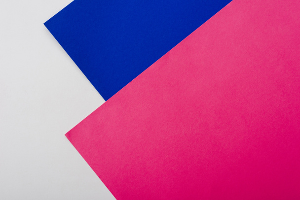 abstract geometric background with white, pink, blue paper - Fotografie, Obrázek