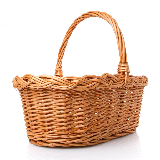 Big square brown wicker basket made of vines on a white background. Side view. - Photo, Image