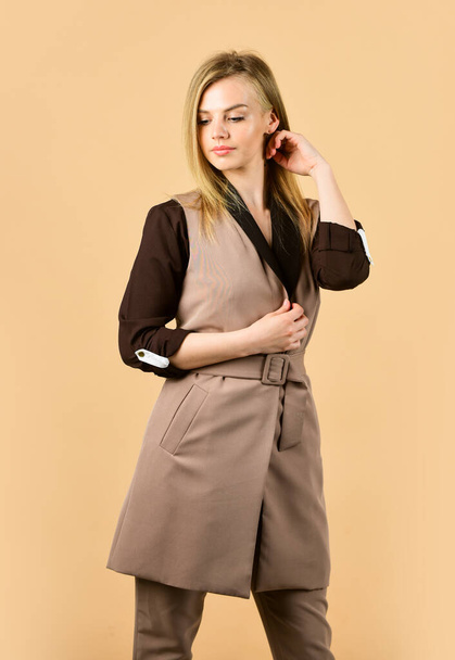 female autumn fashion. style for real woman. wear trendy color only. woman in classy elegant jacket. businesswoman wear formal suit. hairdresser beauty salon. cute girl has long hair. I love it - Valokuva, kuva