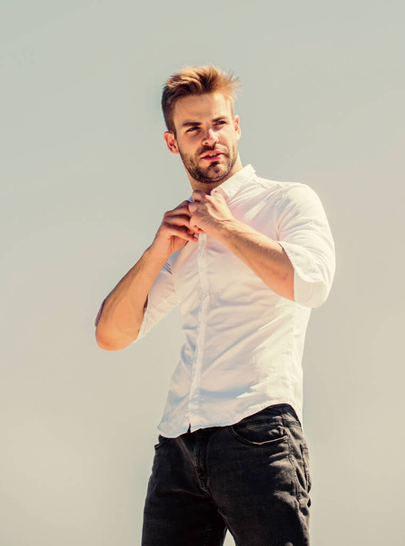 Formal fashion. Formal style. Attractive man taking off shirt. Confident in his appealing. Bearded guy business style. Hot day outdoors. Handsome man fashion model. Sexy macho man. Heat season - Foto, imagen