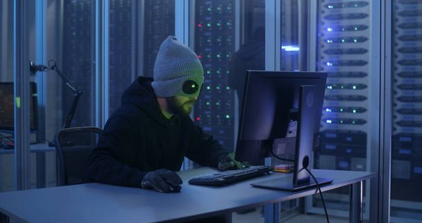 Hackers breaking into a data center - Photo, Image